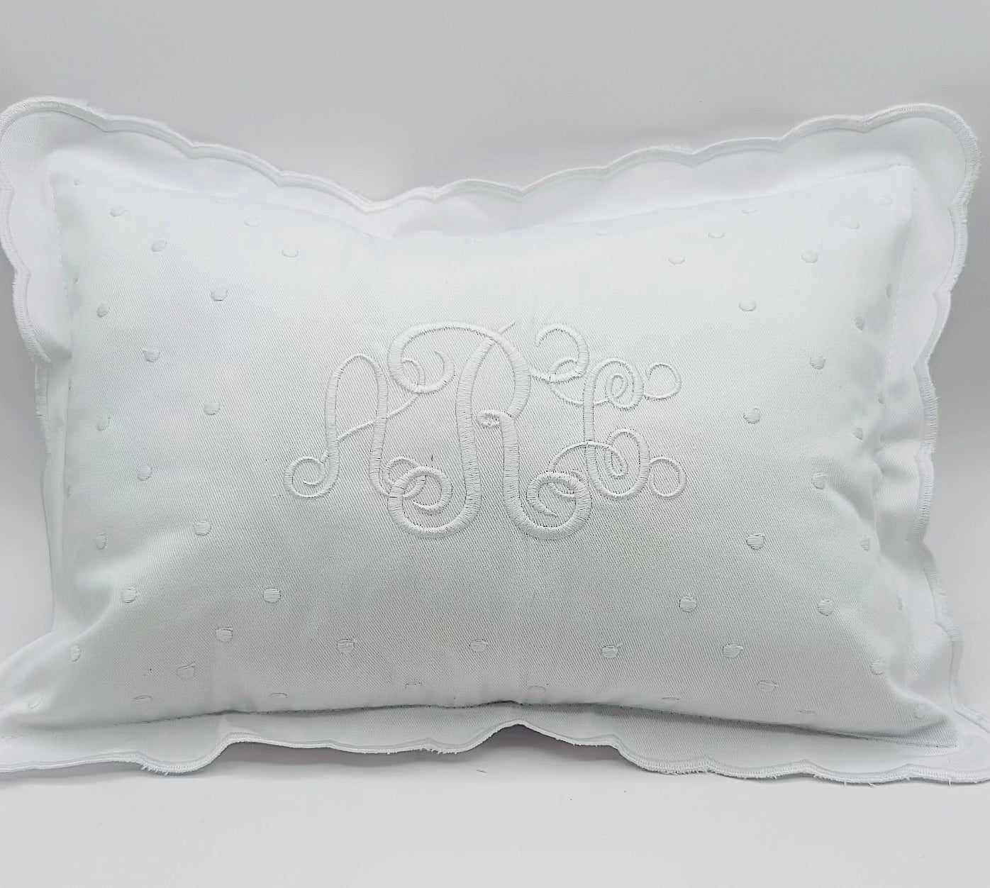 White dots scalloped cotton pillow